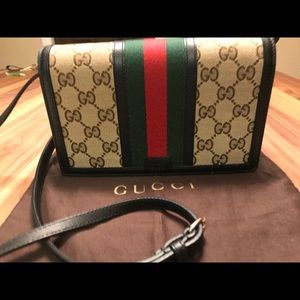 Gucci women's natural vintage web wallet.